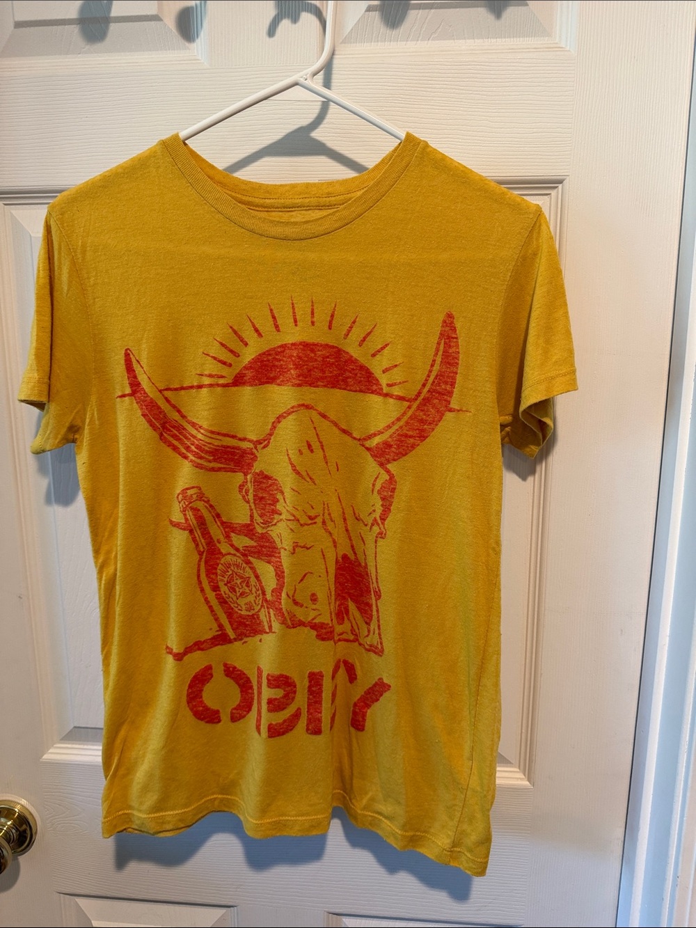 Obey Yellow Short-Sleeve Tee with Red/Burnt Orange Skull Graphic